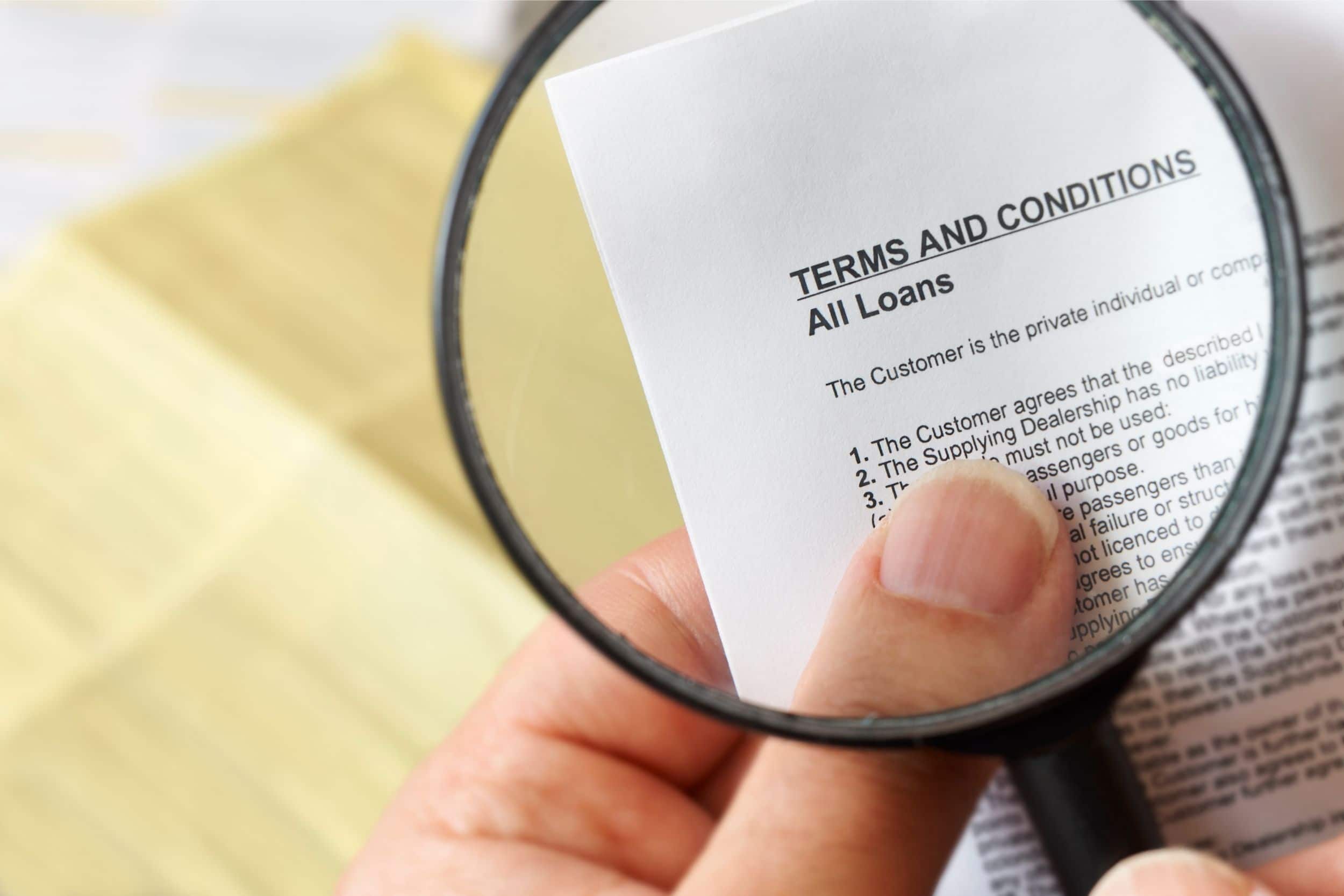 Magnifying glass on loan terms and conditions