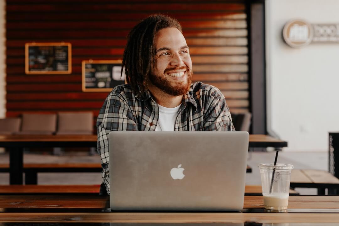 A man applying for quick loan through his laptop
