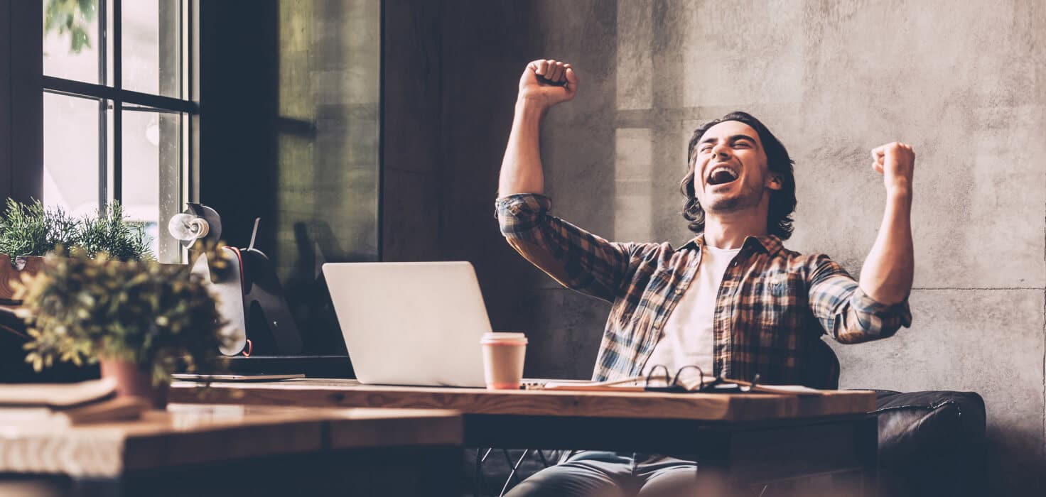 Excited man who received approval on a quick loan