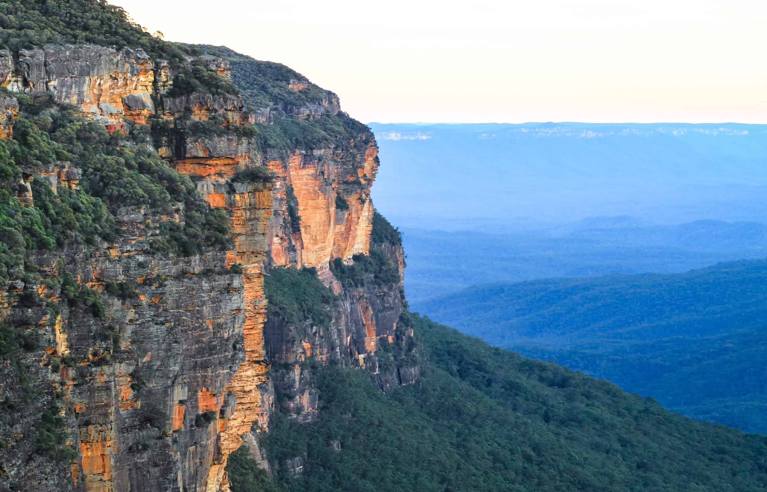 Large rocky cliffs and characteristic blue haze in the Blue Moun